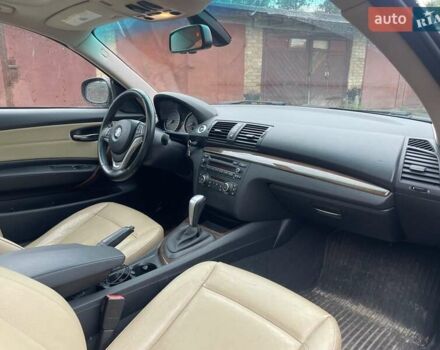 Черный БМВ 1 Серия, объемом двигателя 3 л и пробегом 185 тыс. км за 8399 $, фото 1 на Automoto.ua