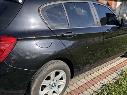 Черный БМВ 1 Серия, объемом двигателя 1.6 л и пробегом 347 тыс. км за 8700 $, фото 1 на Automoto.ua