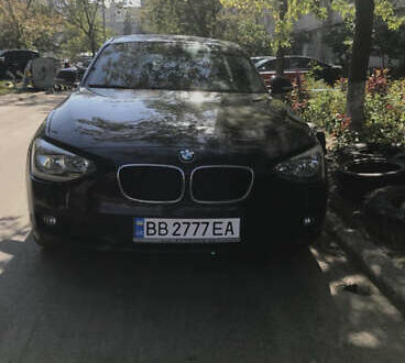 Черный БМВ 1 Серия, объемом двигателя 2 л и пробегом 188 тыс. км за 13500 $, фото 1 на Automoto.ua