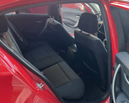 Красный БМВ 1 Серия, объемом двигателя 2 л и пробегом 295 тыс. км за 6800 $, фото 19 на Automoto.ua