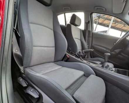 Красный БМВ 1 Серия, объемом двигателя 2 л и пробегом 310 тыс. км за 7200 $, фото 9 на Automoto.ua