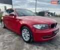 Красный БМВ 1 Серия, объемом двигателя 2 л и пробегом 131 тыс. км за 6700 $, фото 1 на Automoto.ua