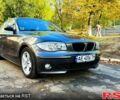 Серый БМВ 1 Серия, объемом двигателя 2 л и пробегом 199 тыс. км за 5900 $, фото 1 на Automoto.ua