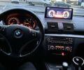 Серый БМВ 1 Серия, объемом двигателя 2 л и пробегом 273 тыс. км за 8300 $, фото 2 на Automoto.ua
