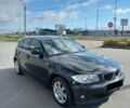 Чорний БМВ 118, об'ємом двигуна 2 л та пробігом 255 тис. км за 6500 $, фото 1 на Automoto.ua