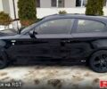 Черный БМВ 118, объемом двигателя 2 л и пробегом 22600 тыс. км за 6000 $, фото 1 на Automoto.ua