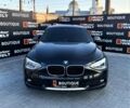 Чорний БМВ 118, об'ємом двигуна 2 л та пробігом 200 тис. км за 12500 $, фото 1 на Automoto.ua