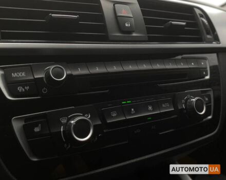 БМВ 118 2017 в Мукачеве на Automoto.ua Черный БМВ 118, объемом двигателя 1.5 л и пробегом 160 тыс. км за 15500 $, фото 18 на Automoto.ua