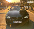 Чорний БМВ 228, об'ємом двигуна 2 л та пробігом 71 тис. км за 21500 $, фото 1 на Automoto.ua