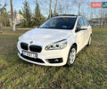 Белый БМВ 2 Series Active Tourer, объемом двигателя 1.6 л и пробегом 175 тыс. км за 18400 $, фото 1 на Automoto.ua