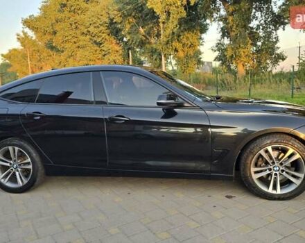 Чорний БМВ 3 Серія ГТ, об'ємом двигуна 2 л та пробігом 150 тис. км за 13300 $, фото 3 на Automoto.ua