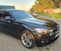 Чорний БМВ 3 Серія ГТ, об'ємом двигуна 2 л та пробігом 150 тис. км за 13300 $, фото 4 на Automoto.ua