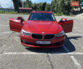 Красный БМВ 3 Серия ГТ, объемом двигателя 2 л и пробегом 160 тыс. км за 12500 $, фото 1 на Automoto.ua