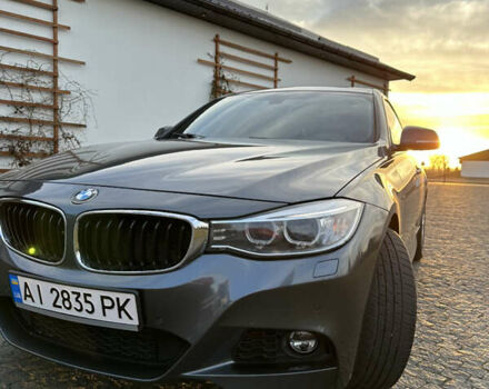 Серый БМВ 3 Серия ГТ, объемом двигателя 2.98 л и пробегом 168 тыс. км за 14000 $, фото 3 на Automoto.ua