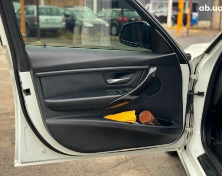 Белый БМВ 3 Серия, объемом двигателя 2 л и пробегом 189 тыс. км за 13290 $, фото 18 на Automoto.ua
