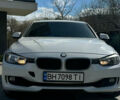 Белый БМВ 3 Серия, объемом двигателя 2 л и пробегом 155 тыс. км за 13299 $, фото 1 на Automoto.ua