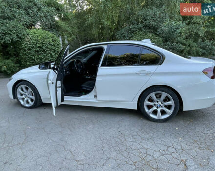 Білий БМВ 3 Серія, об'ємом двигуна 2 л та пробігом 170 тис. км за 15200 $, фото 11 на Automoto.ua