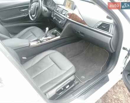 Білий БМВ 3 Серія, об'ємом двигуна 2 л та пробігом 141 тис. км за 13700 $, фото 12 на Automoto.ua
