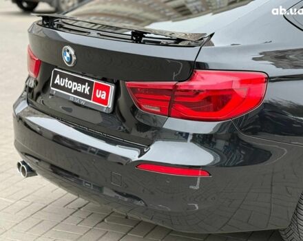 Чорний БМВ 3 Серія, об'ємом двигуна 2 л та пробігом 142 тис. км за 22990 $, фото 10 на Automoto.ua