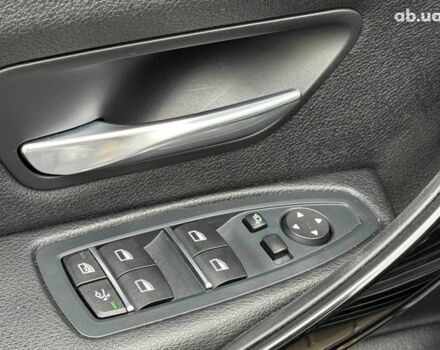 Чорний БМВ 3 Серія, об'ємом двигуна 2 л та пробігом 142 тис. км за 22990 $, фото 13 на Automoto.ua