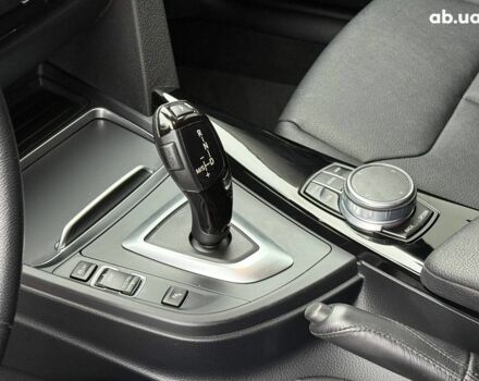 Чорний БМВ 3 Серія, об'ємом двигуна 2 л та пробігом 142 тис. км за 22990 $, фото 15 на Automoto.ua