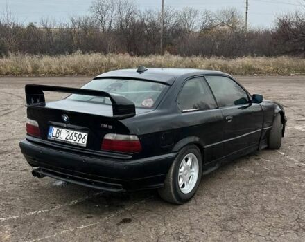 Черный БМВ 3 Серия, объемом двигателя 1 л и пробегом 300 тыс. км за 1630 $, фото 3 на Automoto.ua