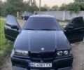 Черный БМВ 3 Серия, объемом двигателя 1.8 л и пробегом 397 тыс. км за 2009 $, фото 1 на Automoto.ua