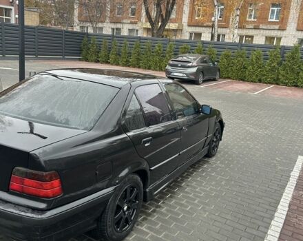 Чорний БМВ 3 Серія, об'ємом двигуна 1.6 л та пробігом 256 тис. км за 2350 $, фото 4 на Automoto.ua