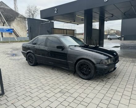 Черный БМВ 3 Серия, объемом двигателя 1.8 л и пробегом 358 тыс. км за 1000 $, фото 1 на Automoto.ua