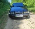 Черный БМВ 3 Серия, объемом двигателя 1 л и пробегом 374 тыс. км за 2476 $, фото 1 на Automoto.ua