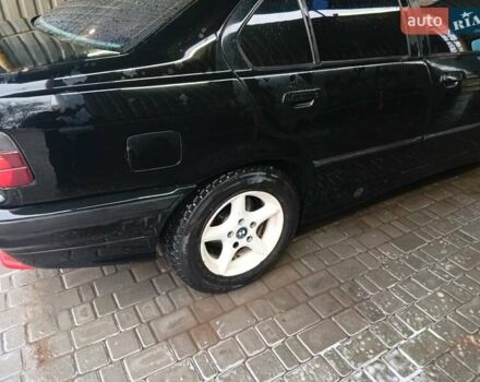 Черный БМВ 3 Серия, объемом двигателя 2.5 л и пробегом 400 тыс. км за 3906 $, фото 3 на Automoto.ua