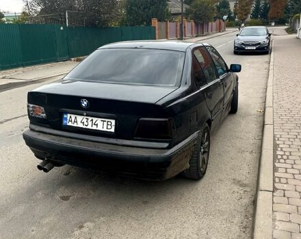 Черный БМВ 3 Серия, объемом двигателя 2.5 л и пробегом 275 тыс. км за 2030 $, фото 1 на Automoto.ua