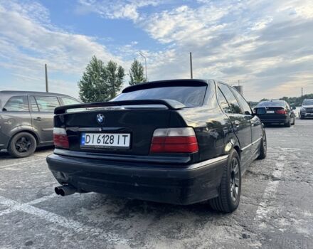 Черный БМВ 3 Серия, объемом двигателя 2.5 л и пробегом 455 тыс. км за 3800 $, фото 1 на Automoto.ua