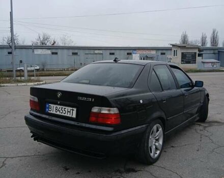 Черный БМВ 3 Серия, объемом двигателя 2.8 л и пробегом 450 тыс. км за 2799 $, фото 3 на Automoto.ua