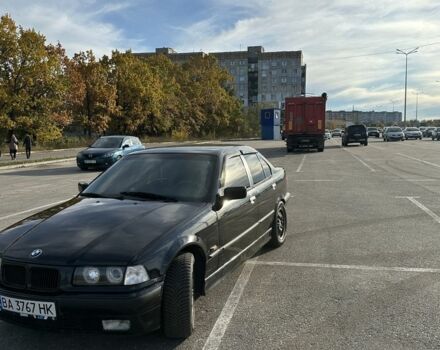Черный БМВ 3 Серия, объемом двигателя 2.5 л и пробегом 425 тыс. км за 4700 $, фото 1 на Automoto.ua