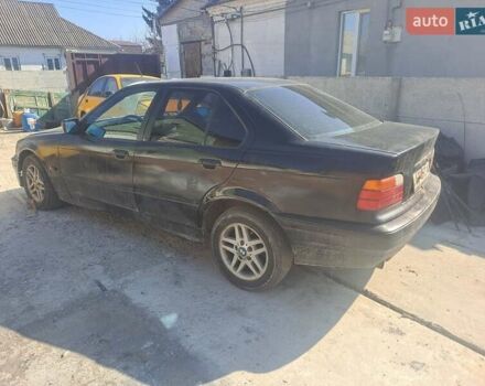 Черный БМВ 3 Серия, объемом двигателя 1.7 л и пробегом 370 тыс. км за 1100 $, фото 1 на Automoto.ua