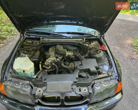 Черный БМВ 3 Серия, объемом двигателя 1.9 л и пробегом 325 тыс. км за 4600 $, фото 12 на Automoto.ua