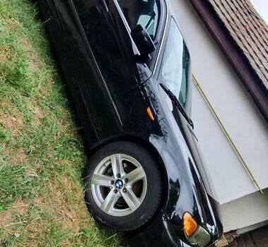 Чорний БМВ 3 Серія, об'ємом двигуна 1.8 л та пробігом 326 тис. км за 5400 $, фото 7 на Automoto.ua