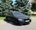 Чорний БМВ 3 Серія, об'ємом двигуна 2 л та пробігом 200 тис. км за 12900 $, фото 1 на Automoto.ua