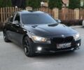 Черный БМВ 3 Серия, объемом двигателя 2 л и пробегом 150 тыс. км за 11950 $, фото 1 на Automoto.ua