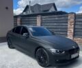 Чорний БМВ 3 Серія, об'ємом двигуна 2 л та пробігом 238 тис. км за 12999 $, фото 1 на Automoto.ua