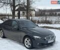 Черный БМВ 3 Серия, объемом двигателя 2 л и пробегом 204 тыс. км за 12000 $, фото 1 на Automoto.ua