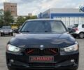 Черный БМВ 3 Серия, объемом двигателя 2 л и пробегом 213 тыс. км за 11492 $, фото 1 на Automoto.ua
