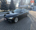 Черный БМВ 3 Серия, объемом двигателя 2 л и пробегом 115 тыс. км за 11800 $, фото 1 на Automoto.ua