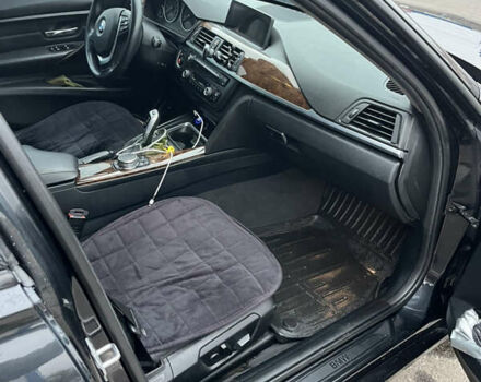 Чорний БМВ 3 Серія, об'ємом двигуна 2 л та пробігом 182 тис. км за 15300 $, фото 12 на Automoto.ua