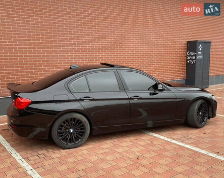 Чорний БМВ 3 Серія, об'ємом двигуна 2 л та пробігом 165 тис. км за 14700 $, фото 4 на Automoto.ua