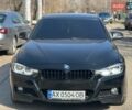 Черный БМВ 3 Серия, объемом двигателя 2 л и пробегом 163 тыс. км за 11800 $, фото 1 на Automoto.ua