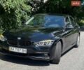 Черный БМВ 3 Серия, объемом двигателя 1.5 л и пробегом 103 тыс. км за 14700 $, фото 1 на Automoto.ua