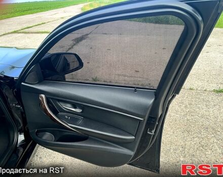Чорний БМВ 3 Серія, об'ємом двигуна 2 л та пробігом 207 тис. км за 12100 $, фото 6 на Automoto.ua