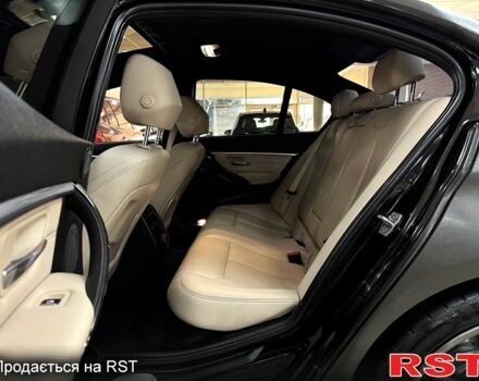 Черный БМВ 3 Серия, объемом двигателя 3 л и пробегом 145 тыс. км за 23500 $, фото 5 на Automoto.ua